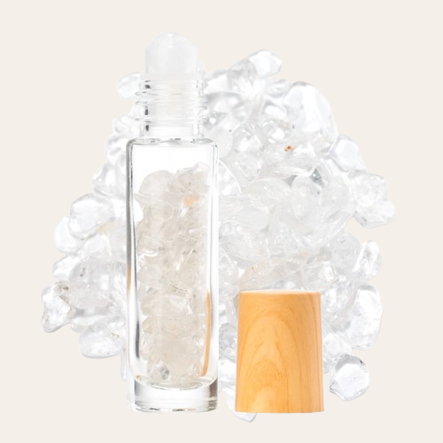 Roll-on en verre avec bouchon en plastique effet bois contenant des pierres naturelles Crystal blanc.